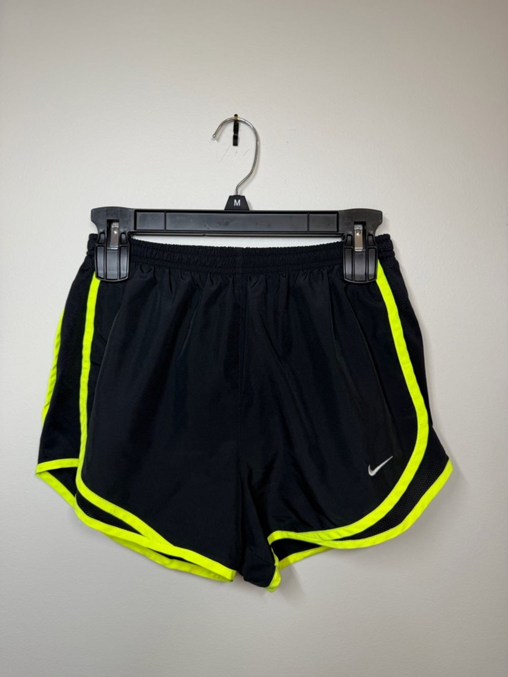 Nike Women's Black Athletic Shorts with Neon Yellow Trim